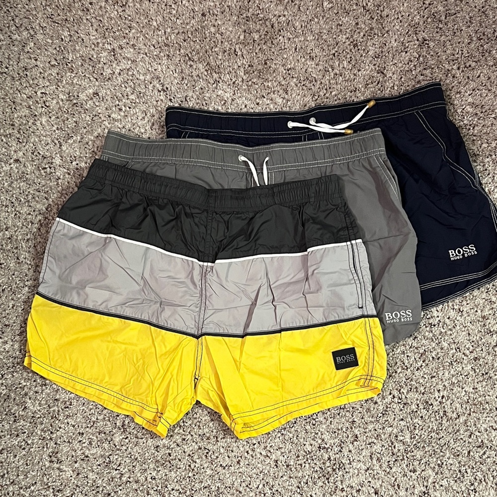 Boss Colorblock Swim Shorts - Yellow, Gray, and Navy.$75 for 3 or $30 each.